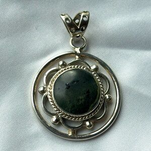 Silver (925) necklace pendant with dark green precious stone.